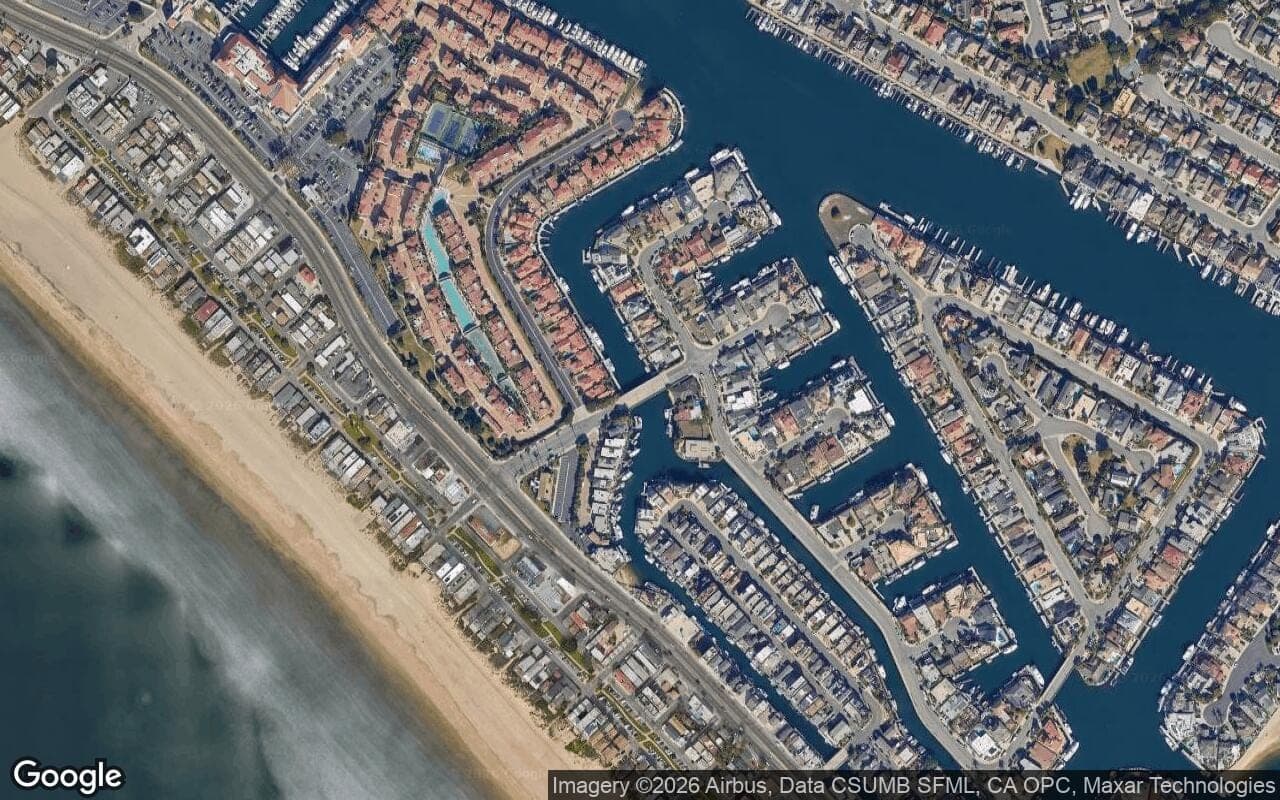 Satellite aerial view of Admiralty Island in Huntington Beach, California, showing the neighborhood's streets and surroundings.