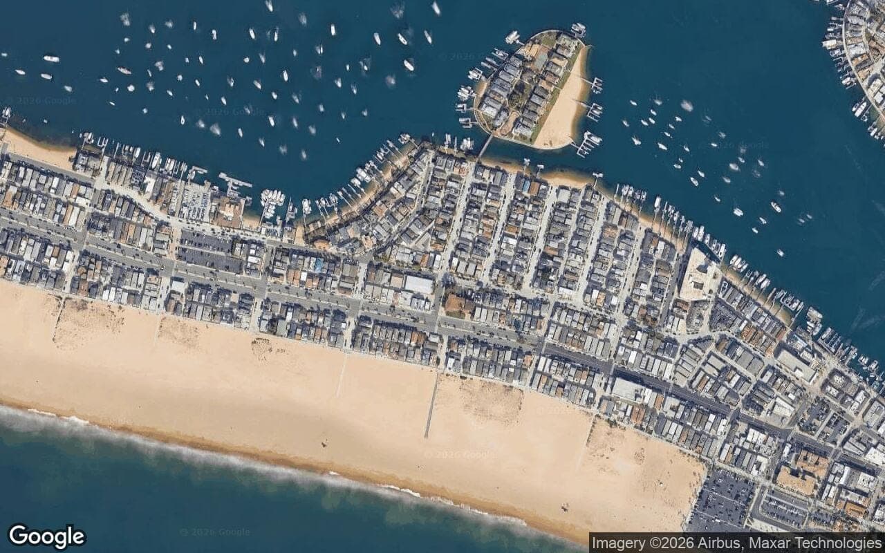 Satellite aerial view of Bay Island in Newport Beach, California, showing the neighborhood's streets and surroundings.