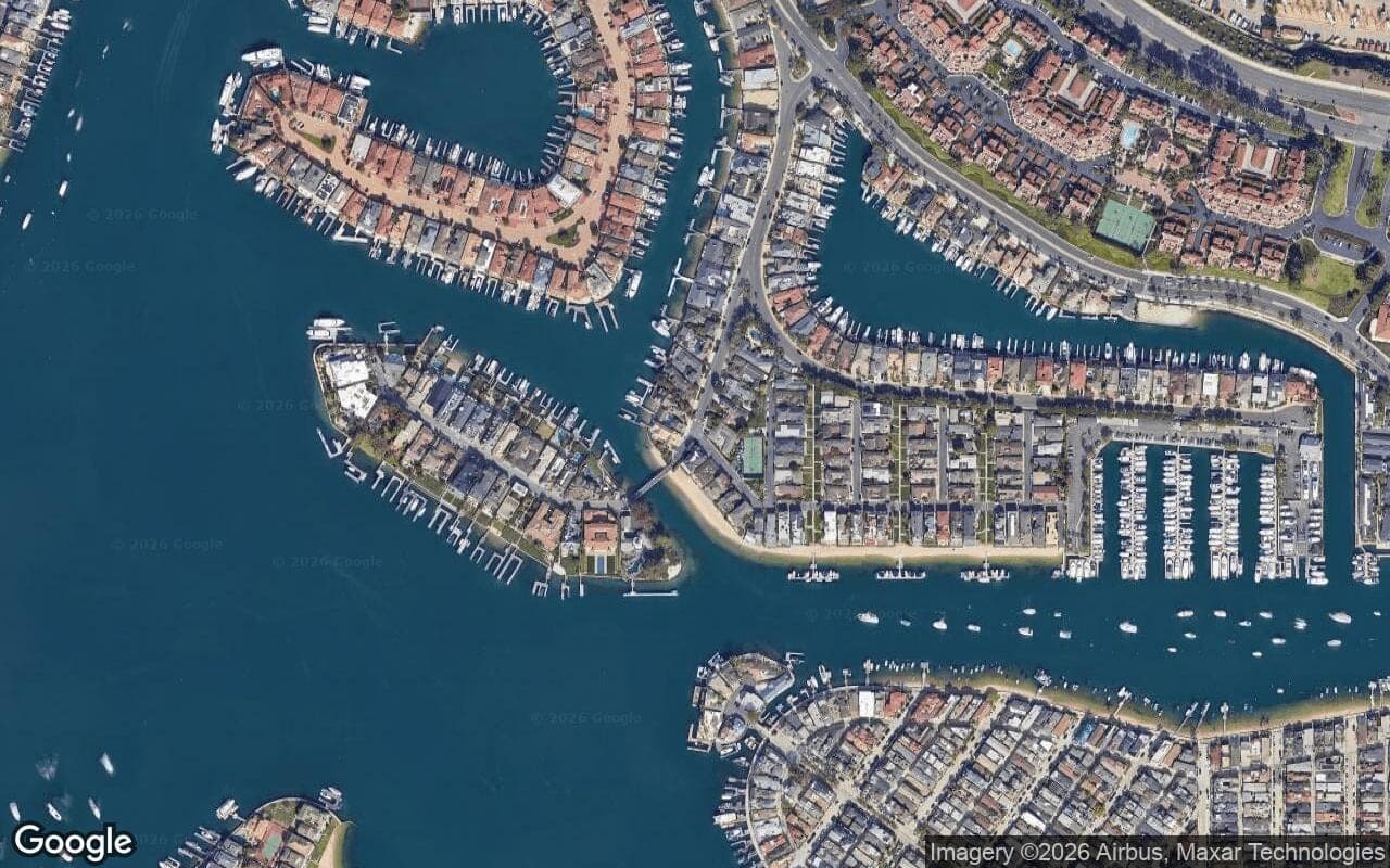 Satellite aerial view of Beacon Bay in Newport Beach, California, showing the neighborhood's streets and surroundings.