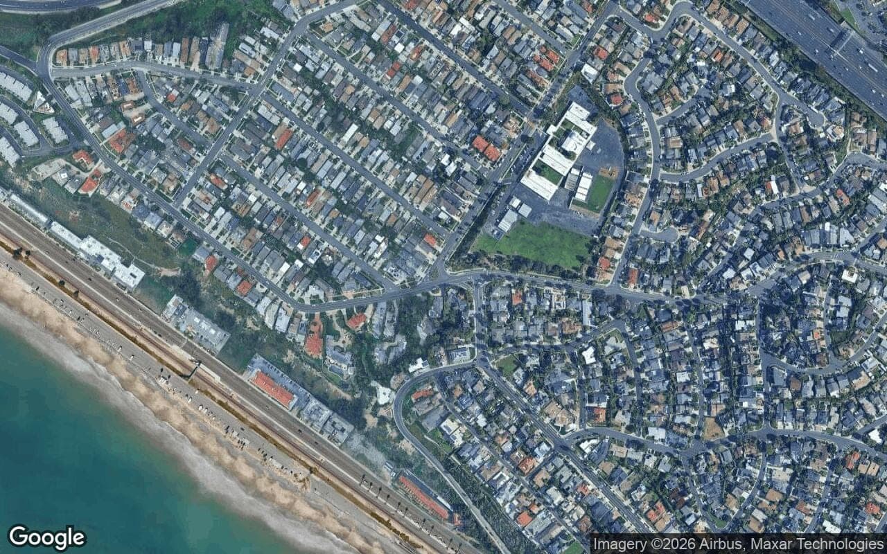 Satellite aerial view of Capistrano Beach in Dana Point, California, showing the neighborhood's streets and surroundings.