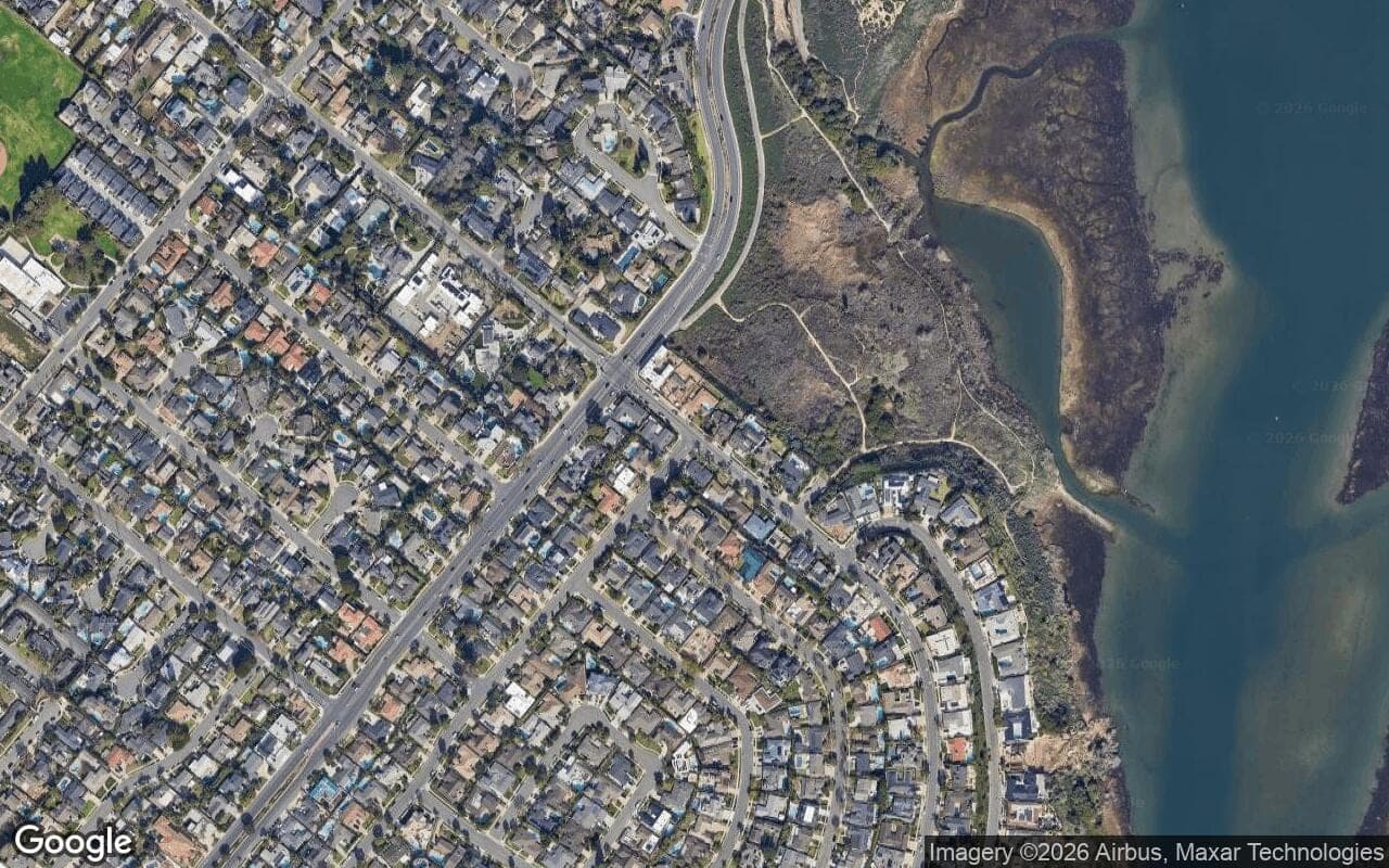 Satellite aerial view of Cherry Lake Estates in Newport Beach, California, showing the neighborhood's streets and surroundings.