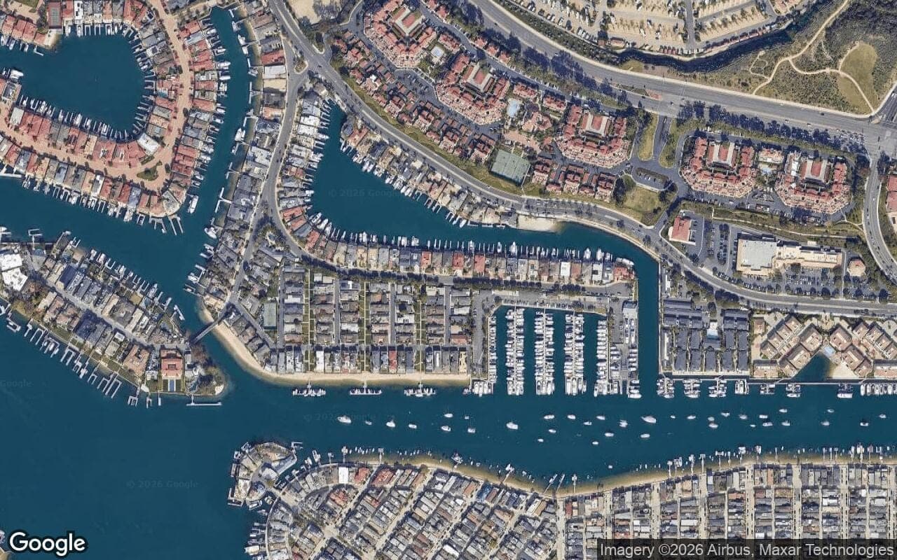Satellite aerial view of Harbor Island Drive Custom in Newport Beach, California, showing the neighborhood's streets and surroundings.