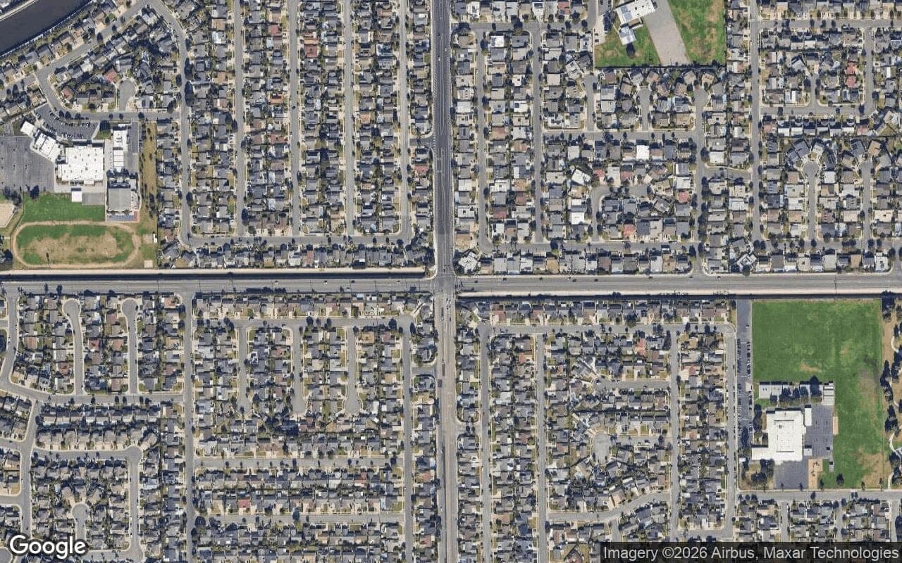 Satellite aerial view of Dutch Haven Marina in Huntington Beach, California, showing the neighborhood's streets and surroundings.