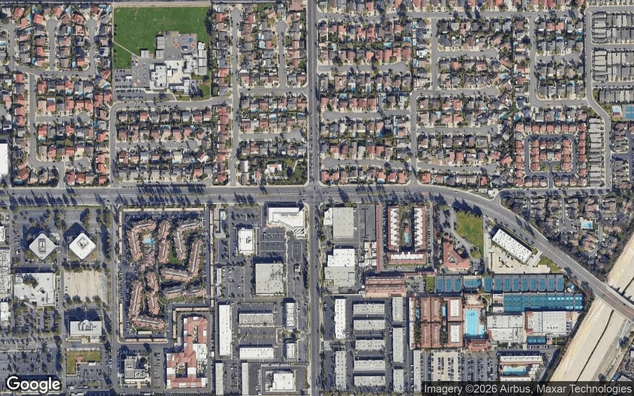 Satellite aerial view of Los Caballeros in Fountain Valley, California, showing the neighborhood's streets and surroundings.