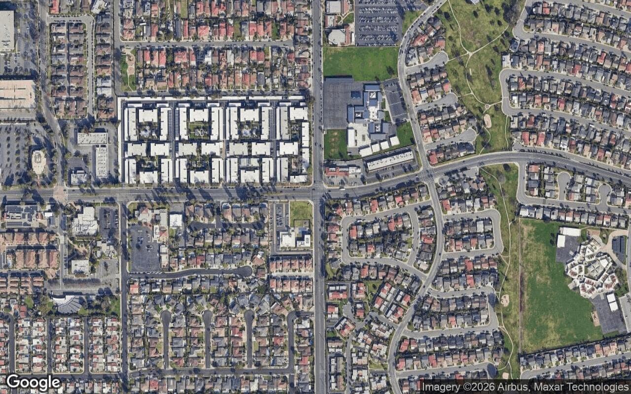 Satellite aerial view of Meadow Homes I in Fountain Valley, California, showing the neighborhood's streets and surroundings.