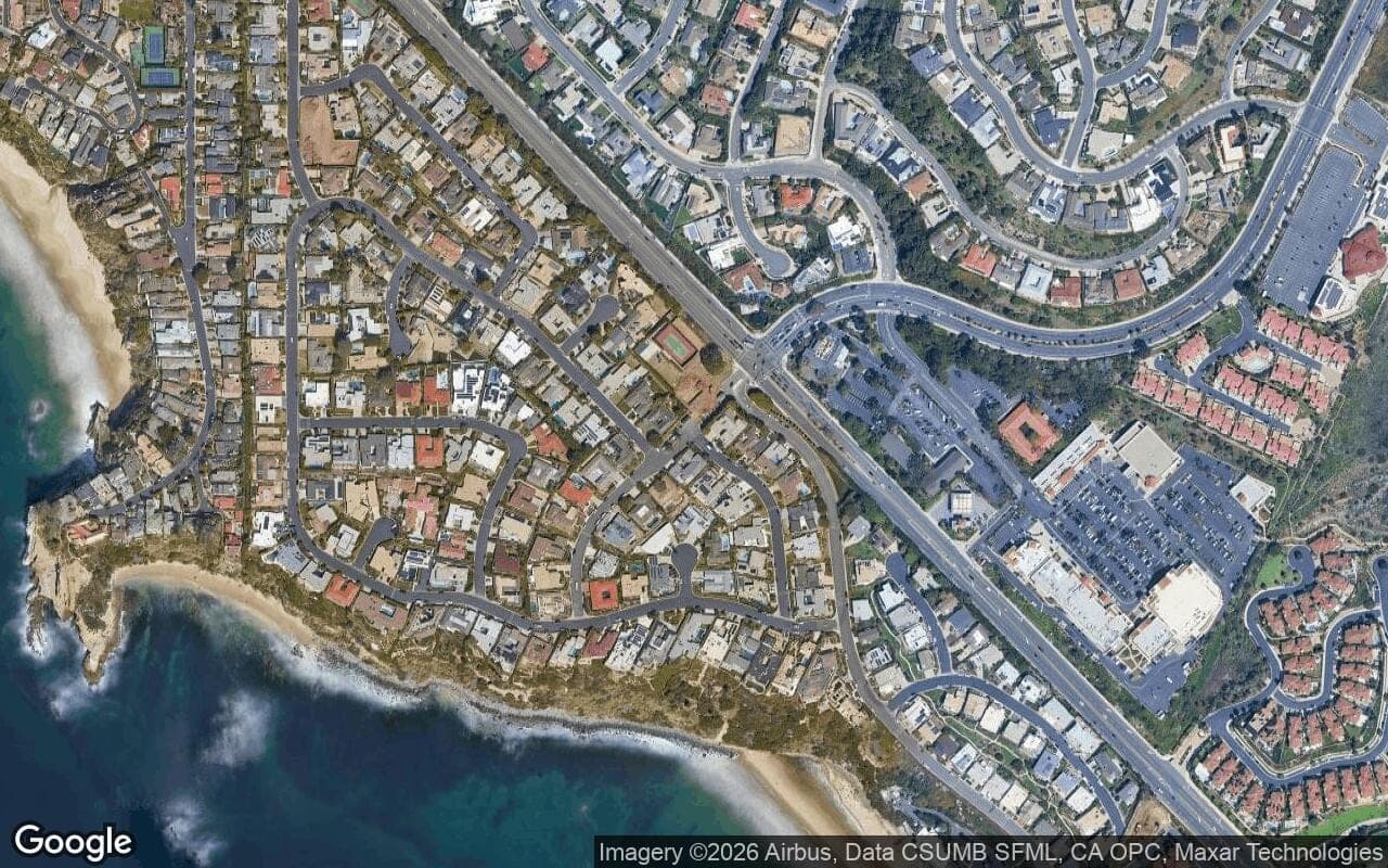 Satellite aerial view of Monarch Bay in Dana Point, California, showing the neighborhood's streets and surroundings.
