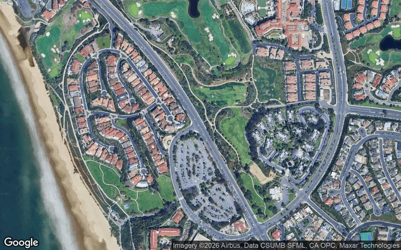 Satellite aerial view of Monarch Beach in Dana Point, California, showing the neighborhood's streets and surroundings.