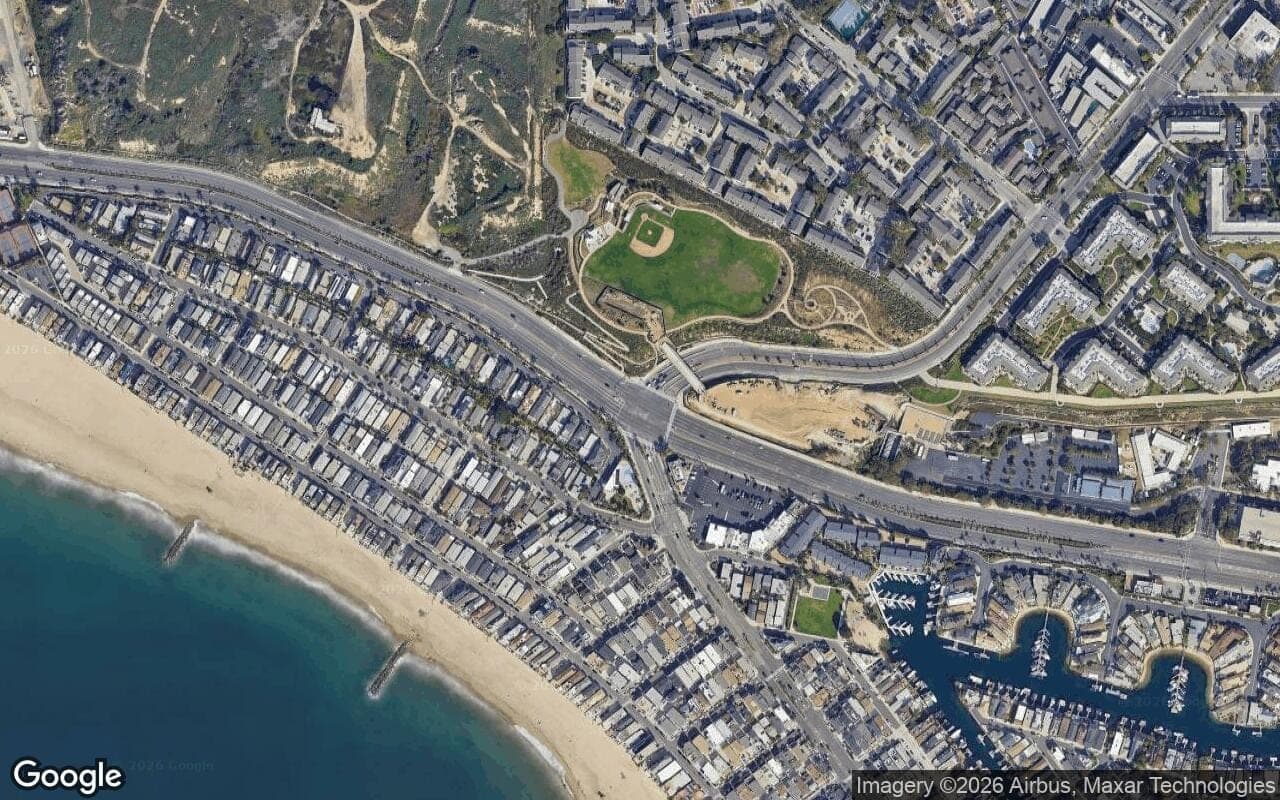Satellite aerial view of One Nautical Mile in Newport Beach, California, showing the neighborhood's streets and surroundings.