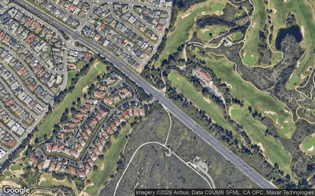 Satellite aerial view of Pelican Point in Newport Coast, California, showing the neighborhood's streets and surroundings.