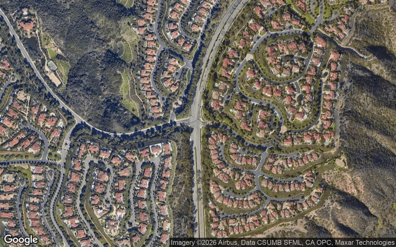 Satellite aerial view of Pelican Ridge in Newport Coast, California, showing the neighborhood's streets and surroundings.