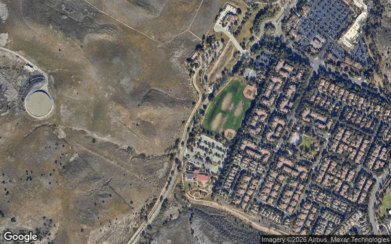 Satellite aerial view of Quail Hill in Irvine, California, showing the neighborhood's streets and surroundings.
