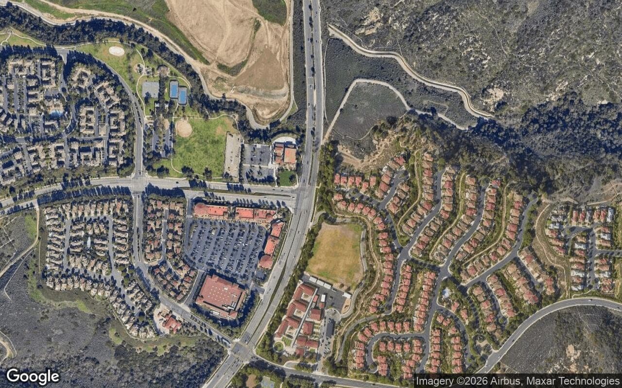 Satellite aerial view of Tesoro Crest in Newport Coast, California, showing the neighborhood's streets and surroundings.