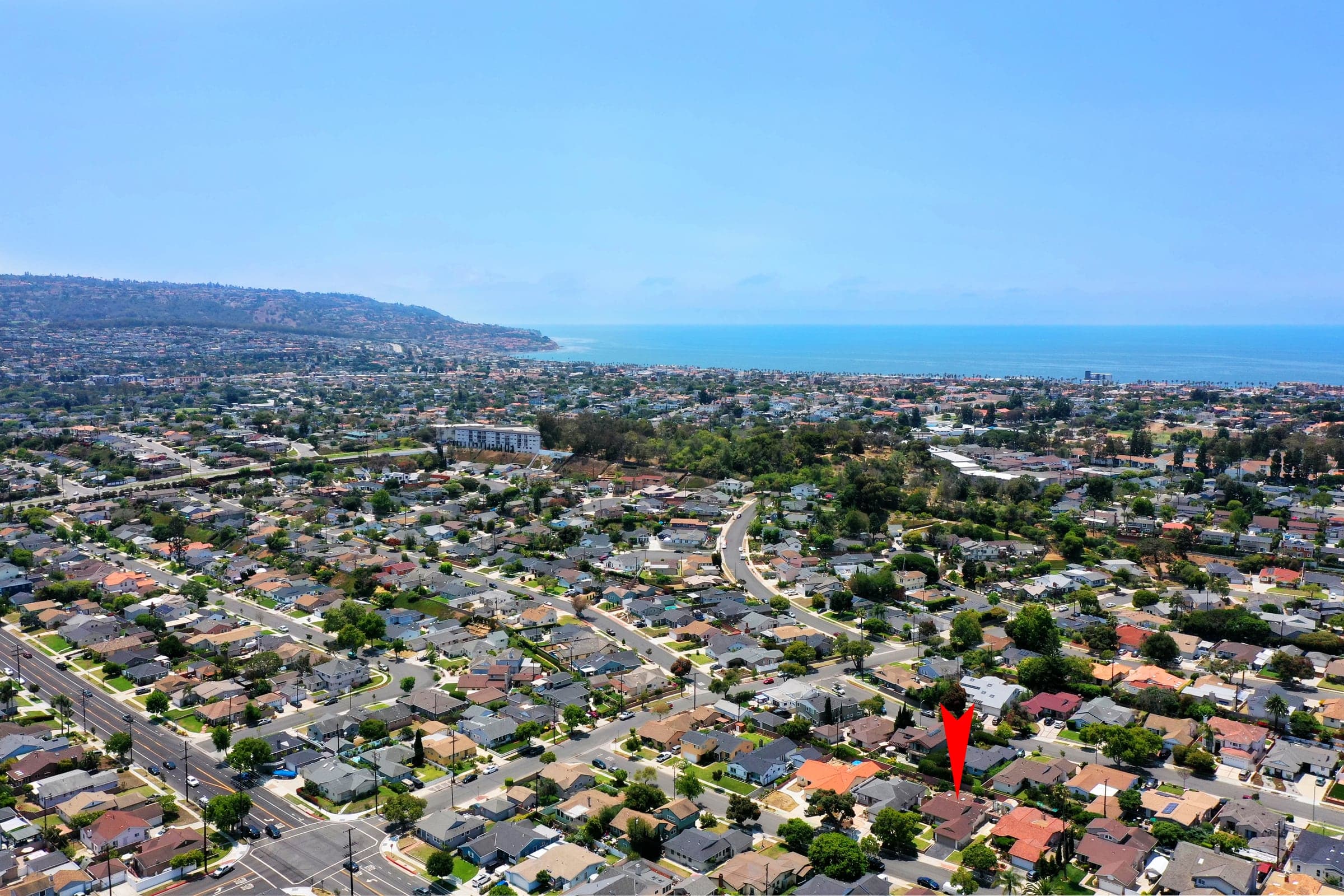 Aerial view of a northwest Huntington Beach neighborhood beside the Bolsa Chica wetlands and reserve.