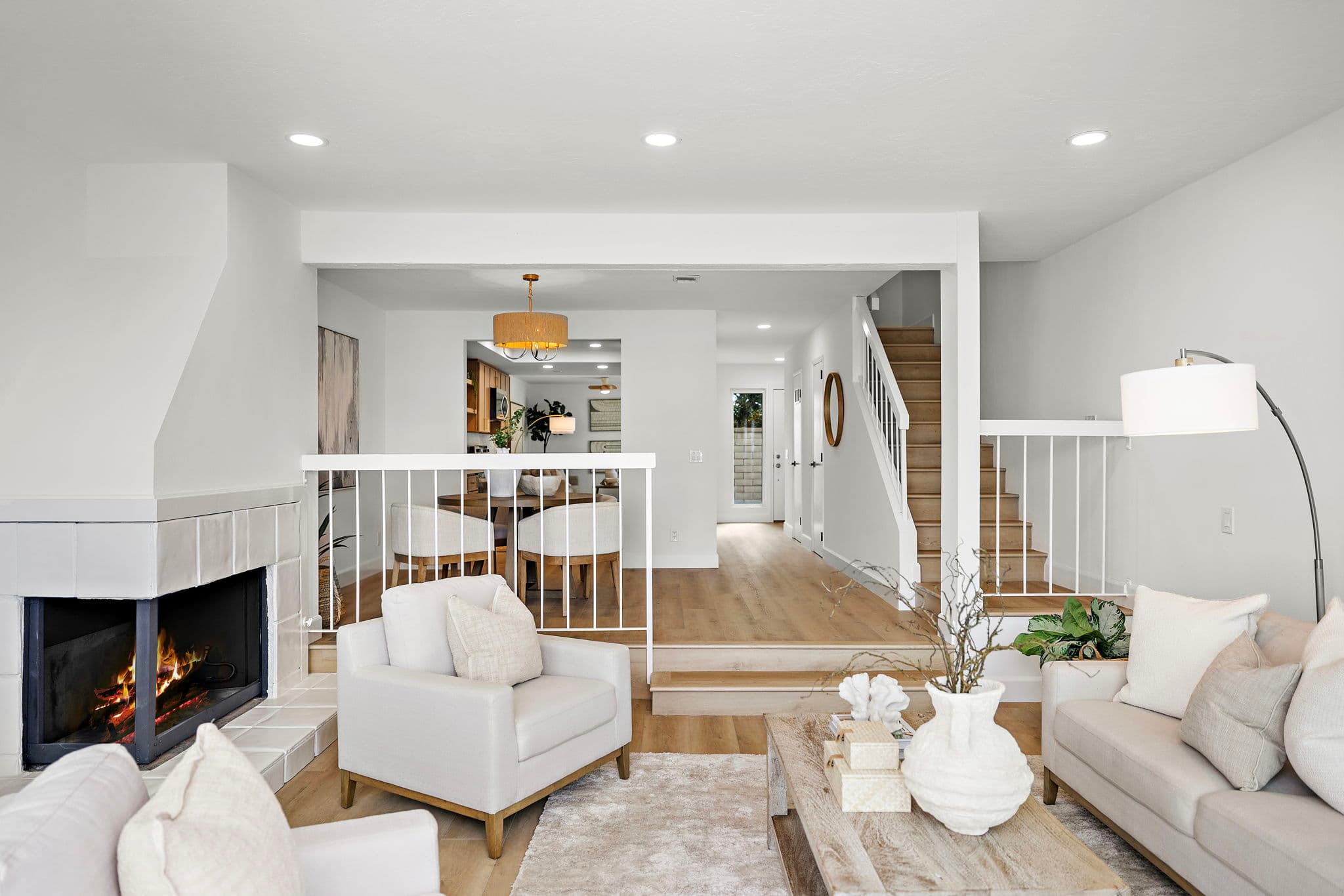 A bright, open living room in a Huntington Beach coastal home.