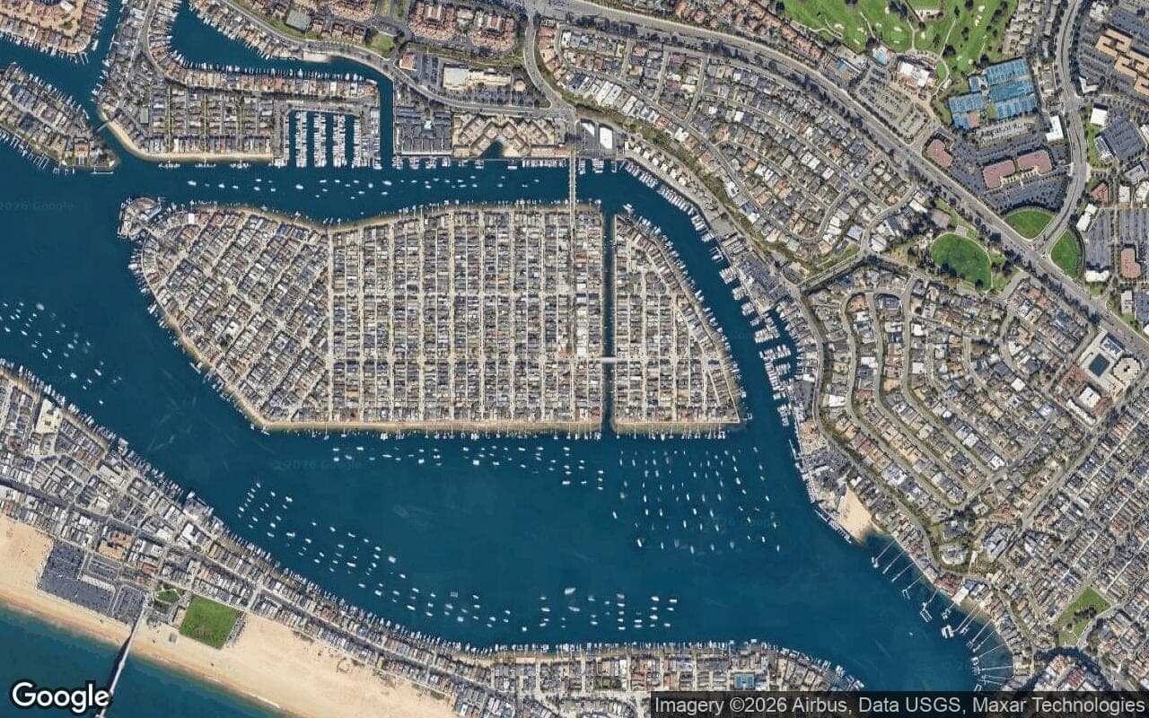 Satellite aerial view of Balboa Island in Newport Beach, California, showing the neighborhood's streets and surroundings.
