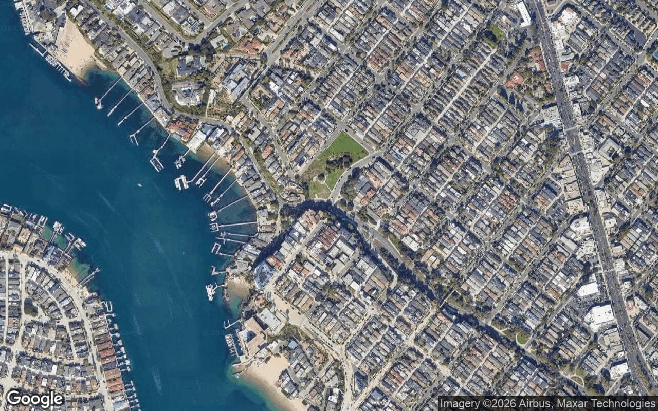 Satellite aerial view of Bay Drive Custom in Corona del Mar, California, showing the neighborhood's streets and surroundings.