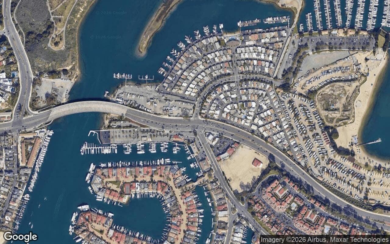 Satellite aerial view of Bayside Village in Newport Beach, California, showing the neighborhood's streets and surroundings.