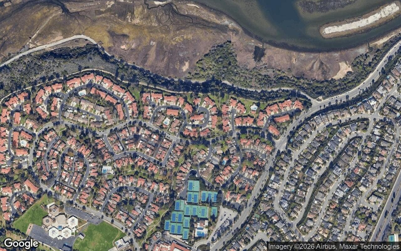 Satellite aerial view of Bluffs Homes on the Bay in Newport Beach, California, showing the neighborhood's streets and surroundings.