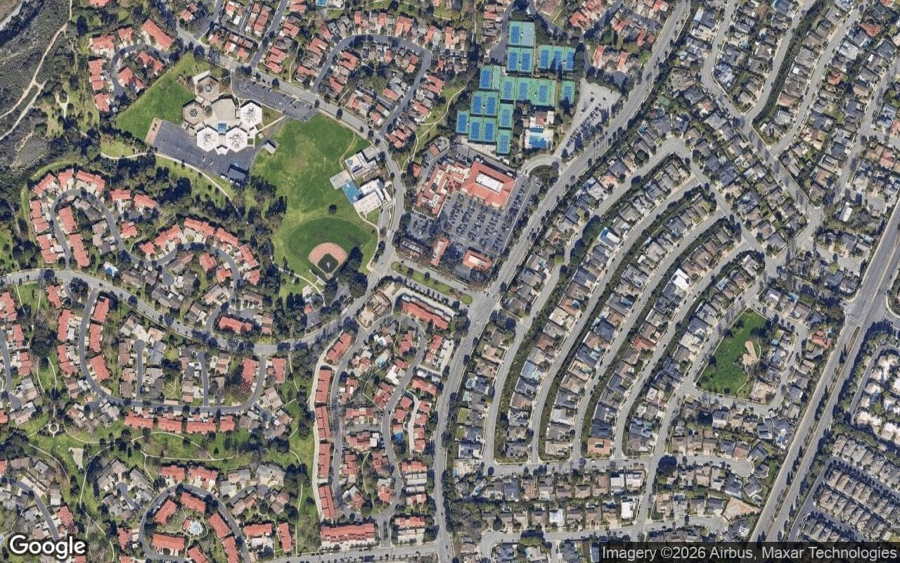 Satellite aerial view of Bluffs Park Homes in Newport Beach, California, showing the neighborhood's streets and surroundings.