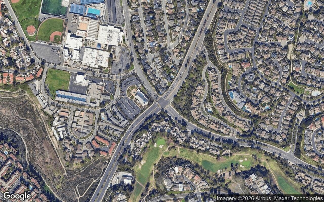 Satellite aerial view of Bluffs Plaza Area in Newport Beach, California, showing the neighborhood's streets and surroundings.