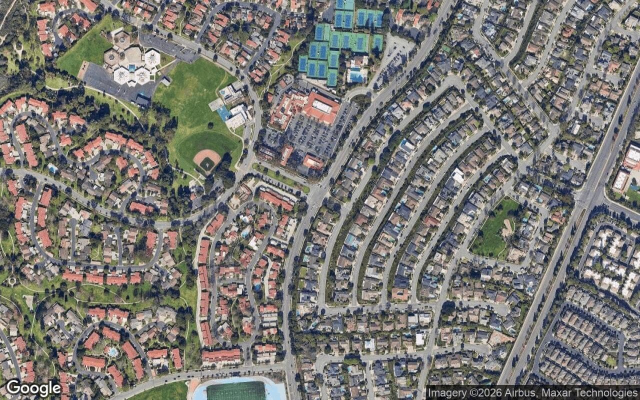 Satellite aerial view of Bluffs Tennis Villas in Newport Beach, California, showing the neighborhood's streets and surroundings.