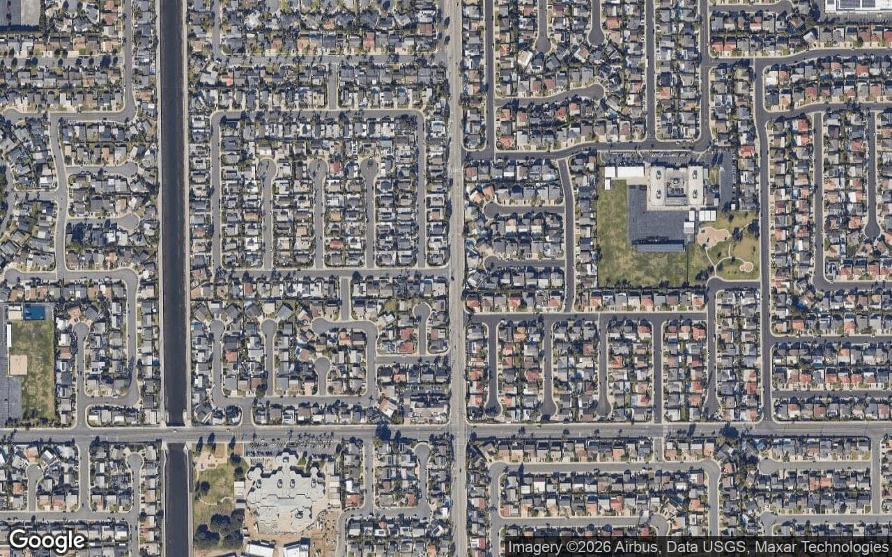 Satellite aerial view of Deane Gardens in Huntington Beach, California, showing the neighborhood's streets and surroundings.