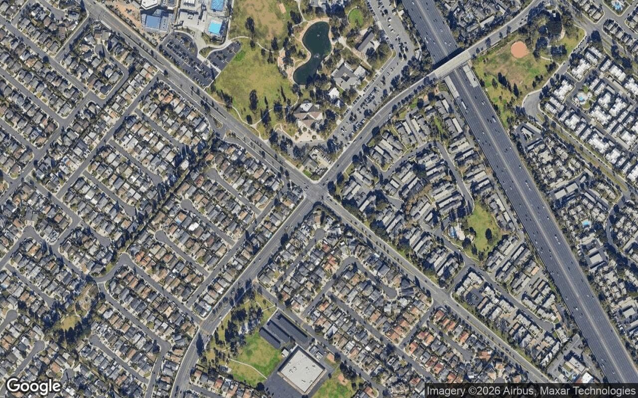 Satellite aerial view of El Camino Real in Irvine, California, showing the neighborhood's streets and surroundings.