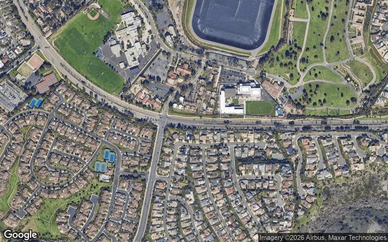 Satellite aerial view of Harbor Woods in Corona del Mar, California, showing the neighborhood's streets and surroundings.