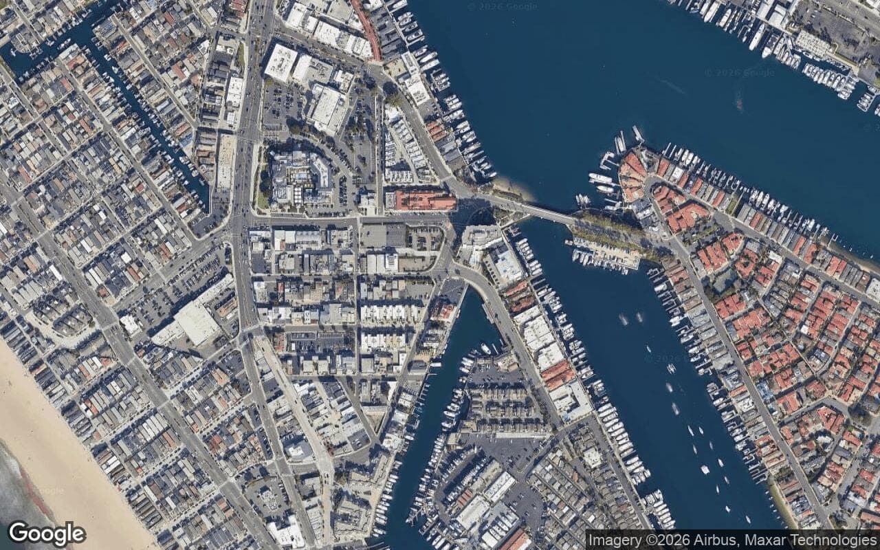 Satellite aerial view of Lido Peninsula in Newport Beach, California, showing the neighborhood's streets and surroundings.