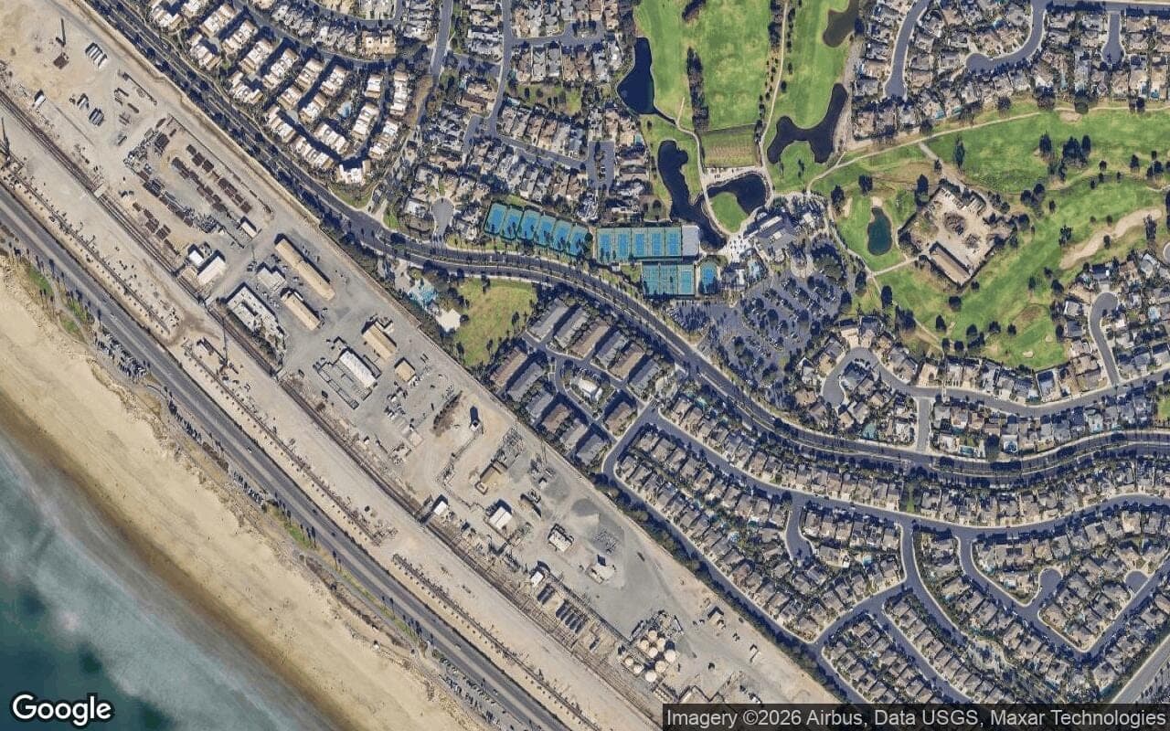 Satellite aerial view of Mystic Pointe in Huntington Beach, California, showing the neighborhood's streets and surroundings.