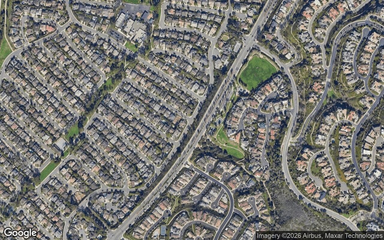 Satellite aerial view of Newport Hills Estates in Newport Beach, California, showing the neighborhood's streets and surroundings.