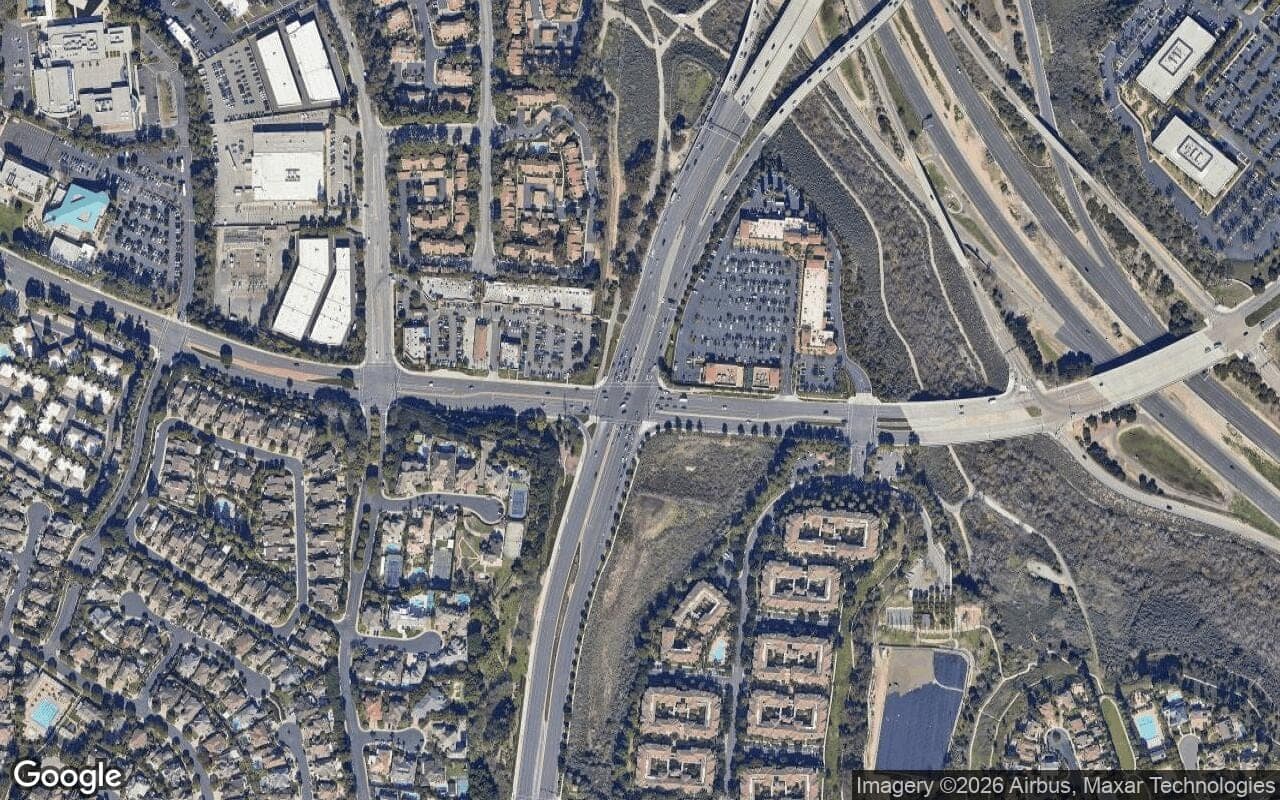 Satellite aerial view of Newport North Townhomes in Newport Beach, California, showing the neighborhood's streets and surroundings.