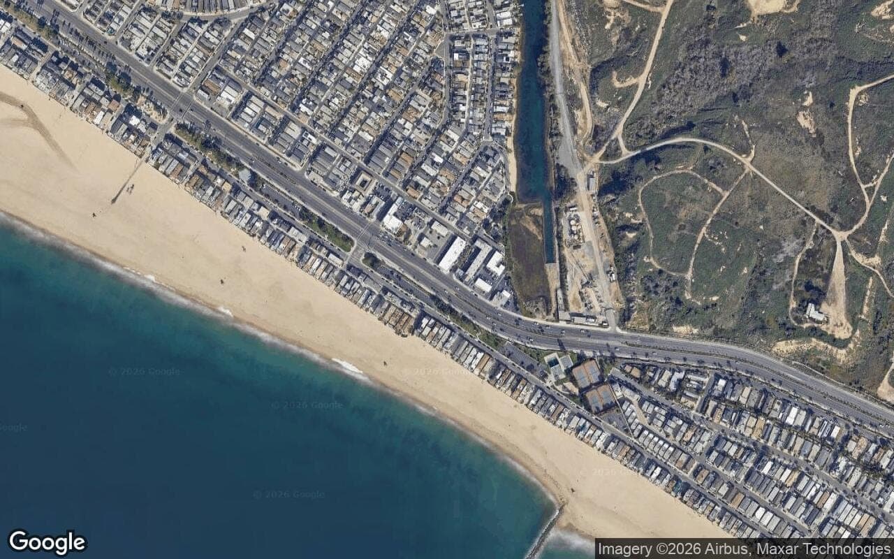 Satellite aerial view of Newport Shores in Newport Beach, California, showing the neighborhood's streets and surroundings.