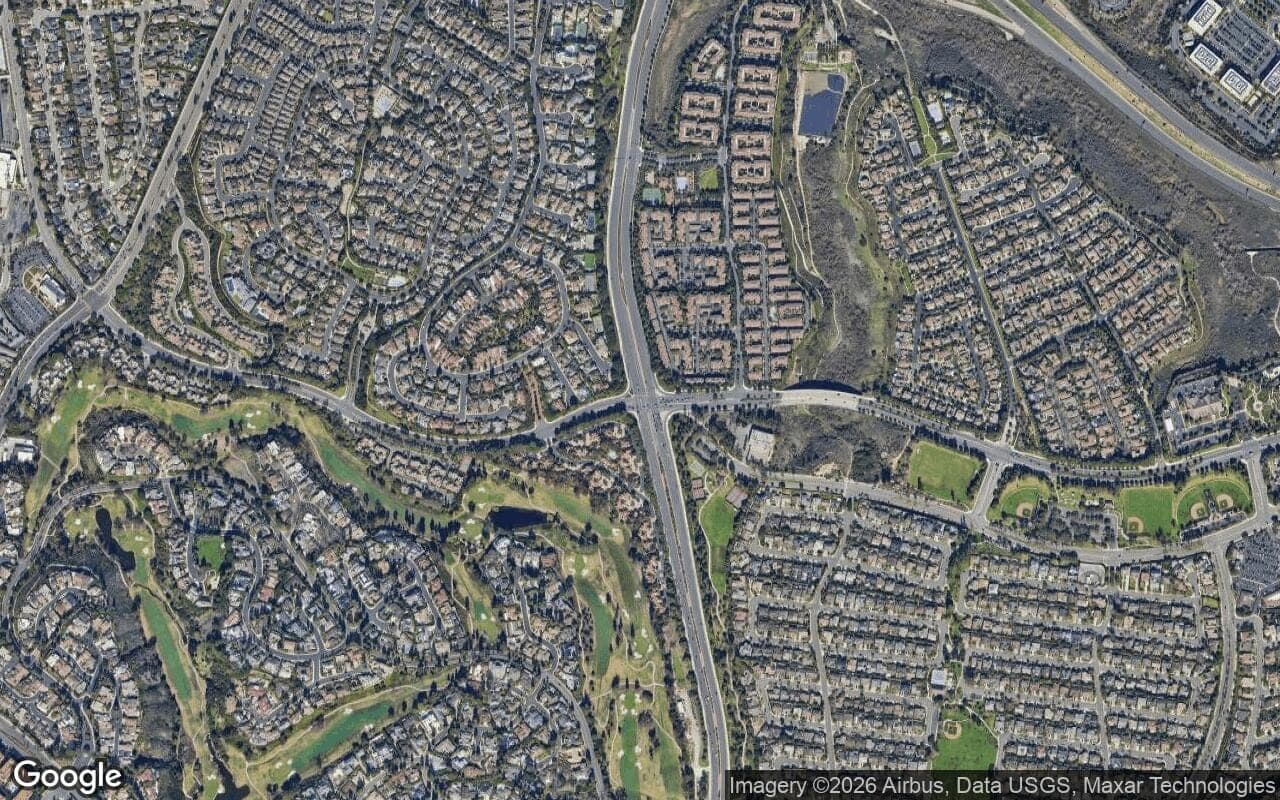 Satellite aerial view of One Ford Road in Newport Beach, California, showing the neighborhood's streets and surroundings.