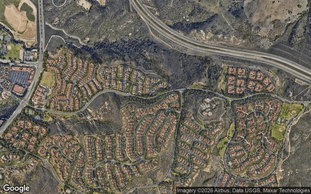Satellite aerial view of Pacific Ridge in Newport Coast, California, showing the neighborhood's streets and surroundings.
