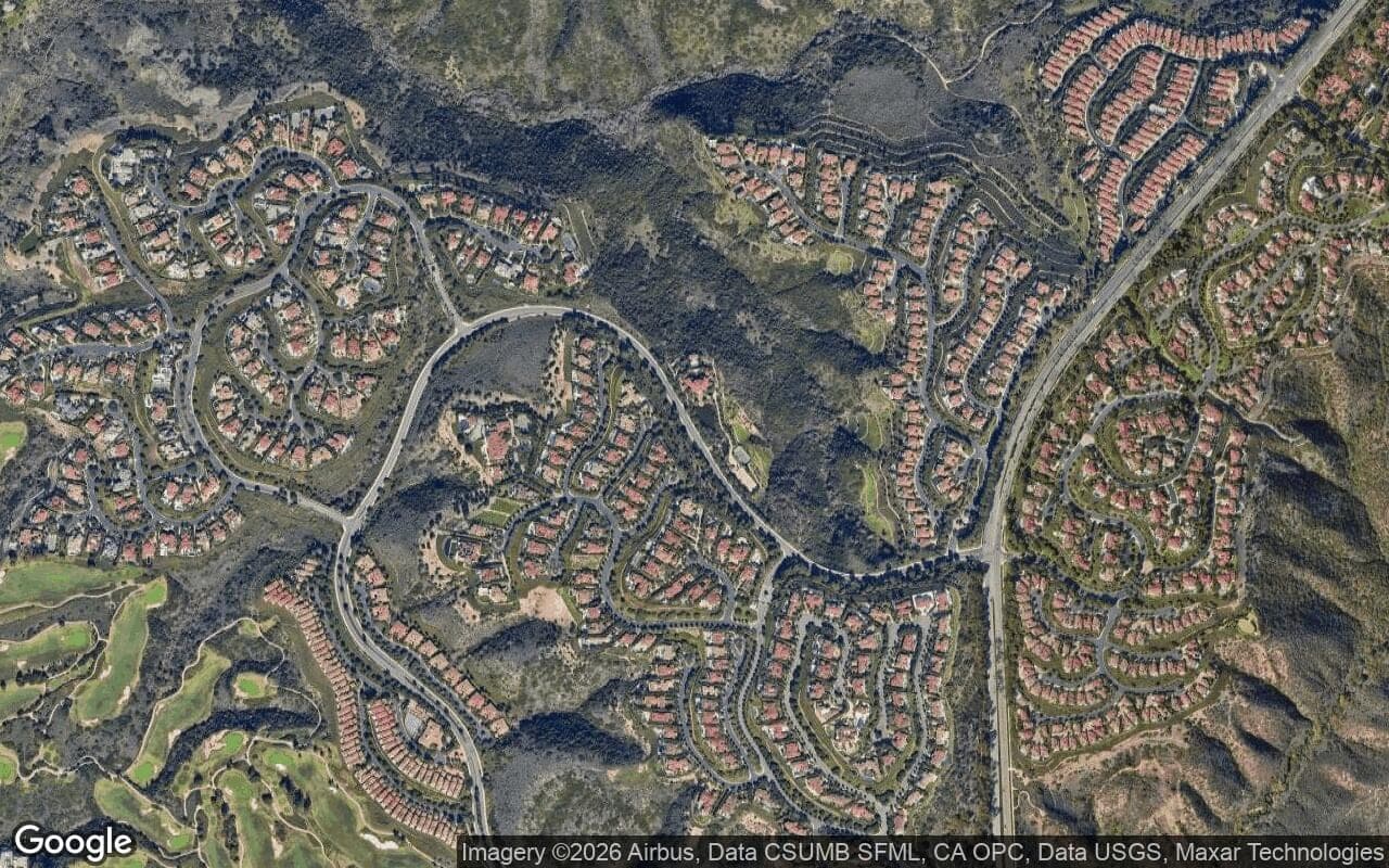 Satellite aerial view of Pelican Hill in Newport Coast, California, showing the neighborhood's streets and surroundings.