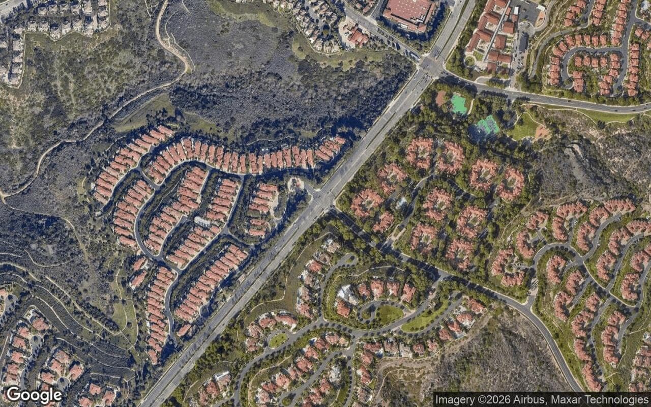 Satellite aerial view of Perazul in Newport Coast, California, showing the neighborhood's streets and surroundings.