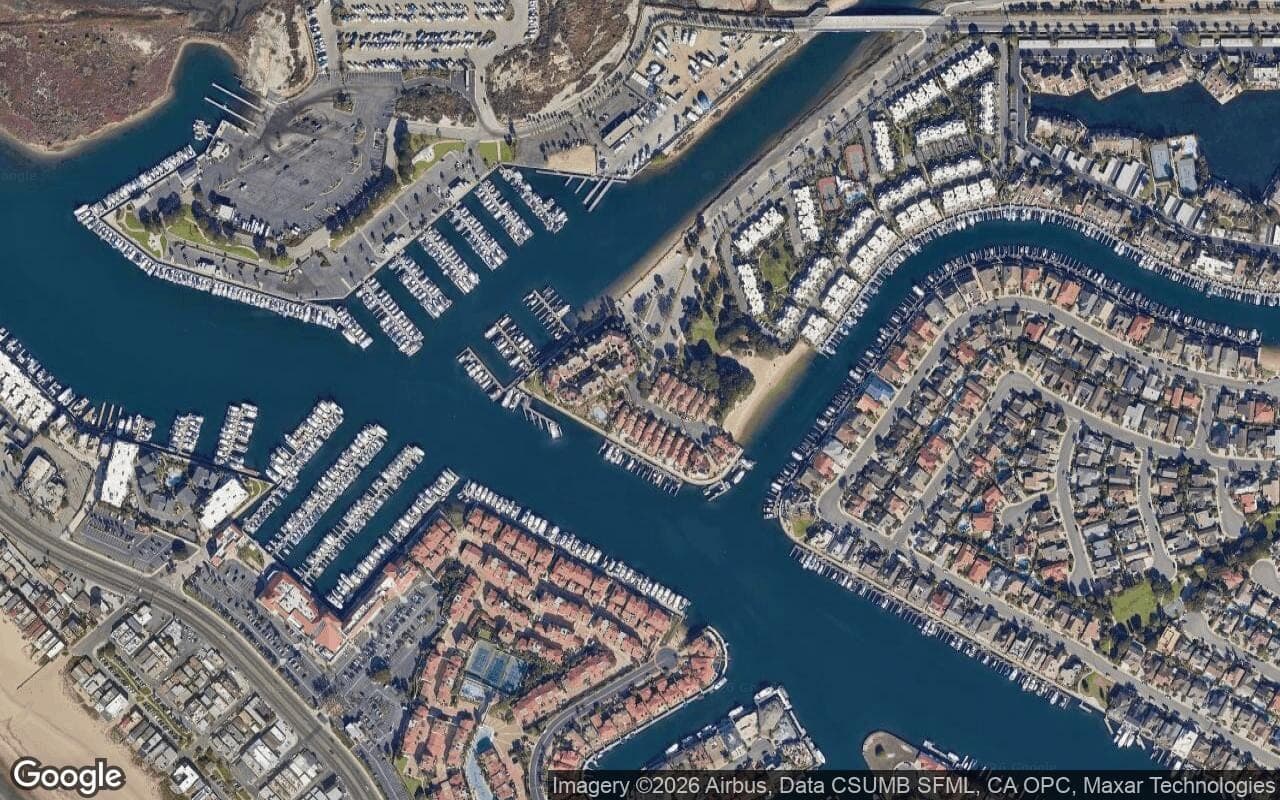 Satellite aerial view of Portofino Cove in Huntington Beach, California, showing the neighborhood's streets and surroundings.