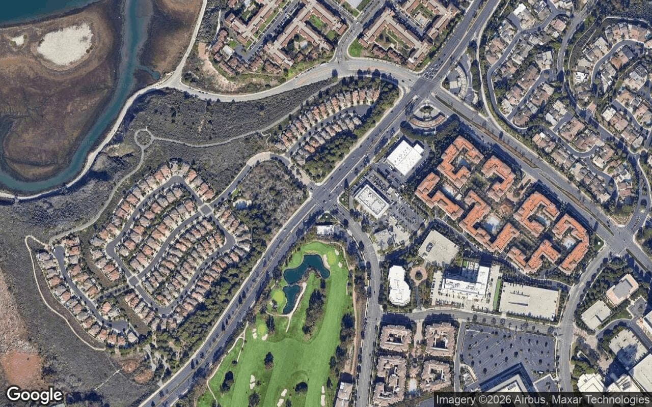 Satellite aerial view of Sea Island in Newport Beach, California, showing the neighborhood's streets and surroundings.