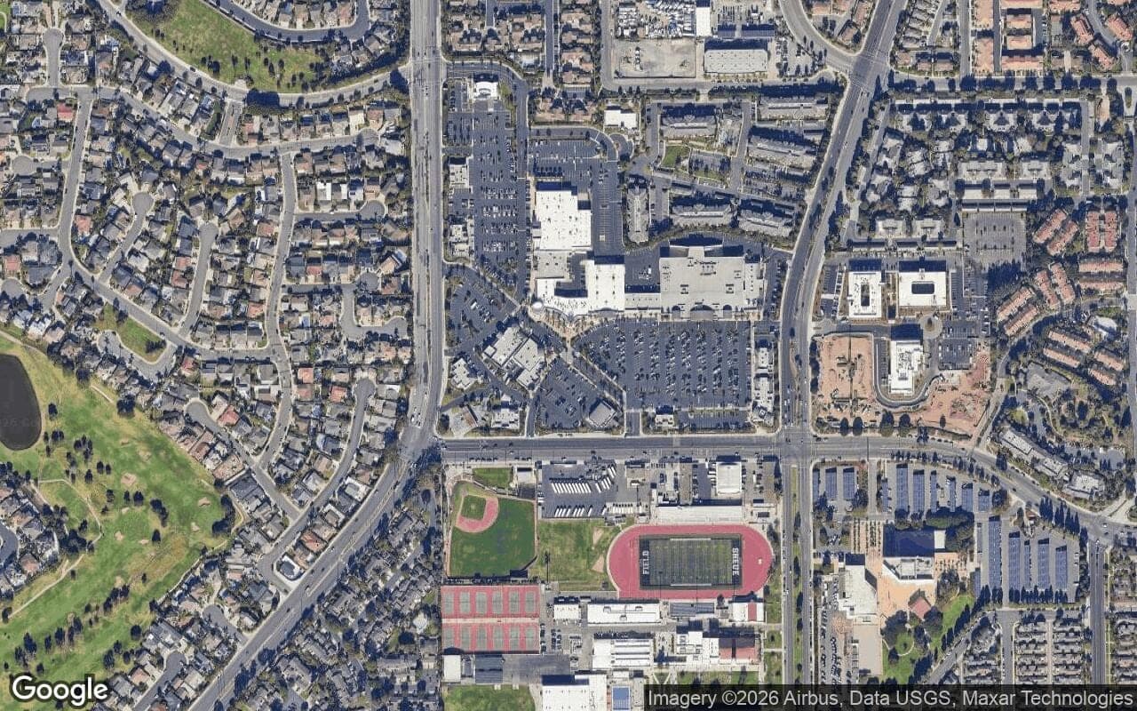 Satellite aerial view of Seacliff on the Greens in Huntington Beach, California, showing the neighborhood's streets and surroundings.