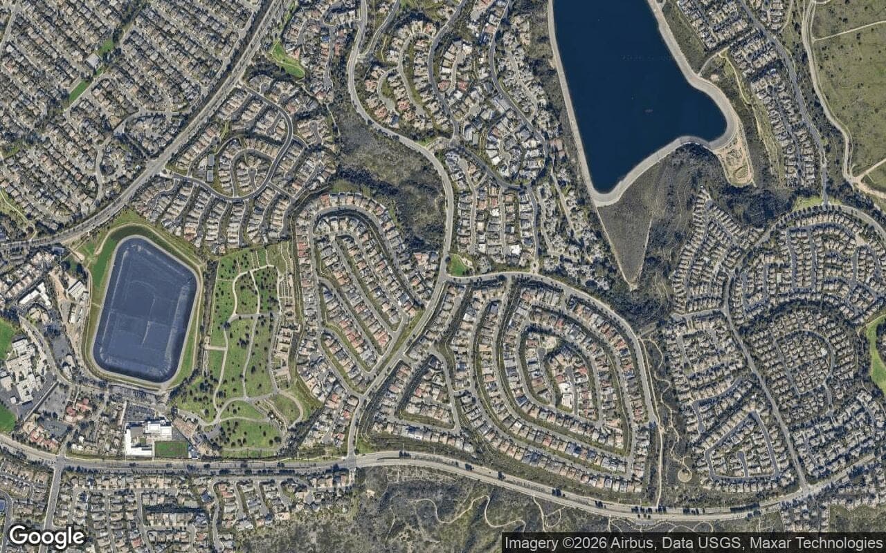 Satellite aerial view of Spyglass Hill in Corona del Mar, California, showing the neighborhood's streets and surroundings.