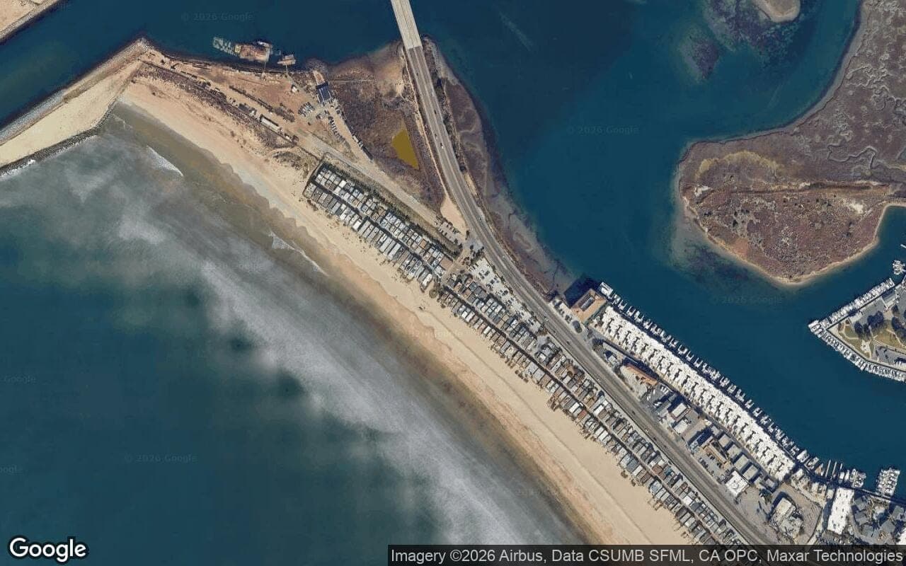 Satellite aerial of Surfside Colony on the sand at Anderson Street, just before the Sunset Beach bridge.