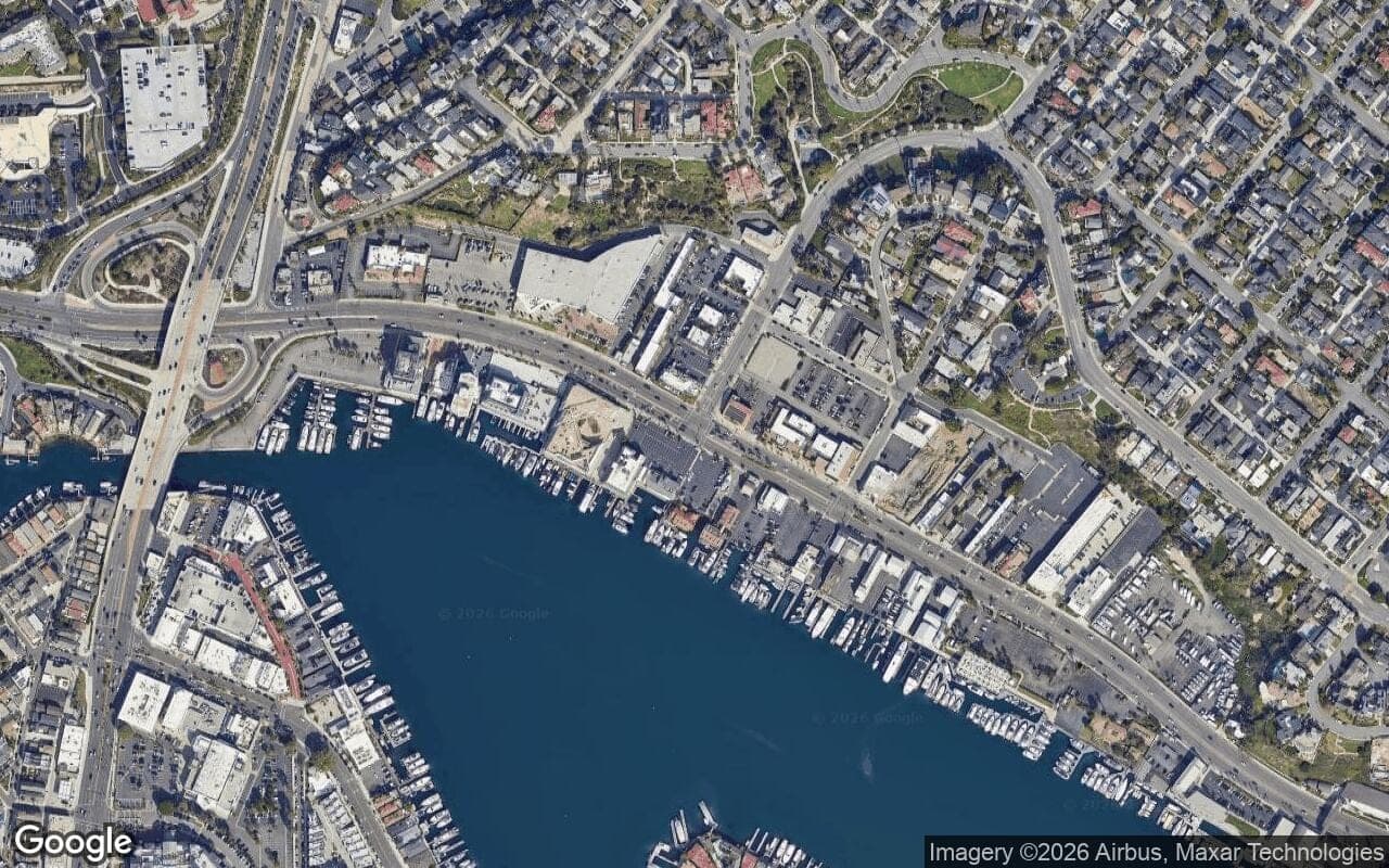 Satellite aerial view of Villa Siena in Newport Beach, California, showing the neighborhood's streets and surroundings.