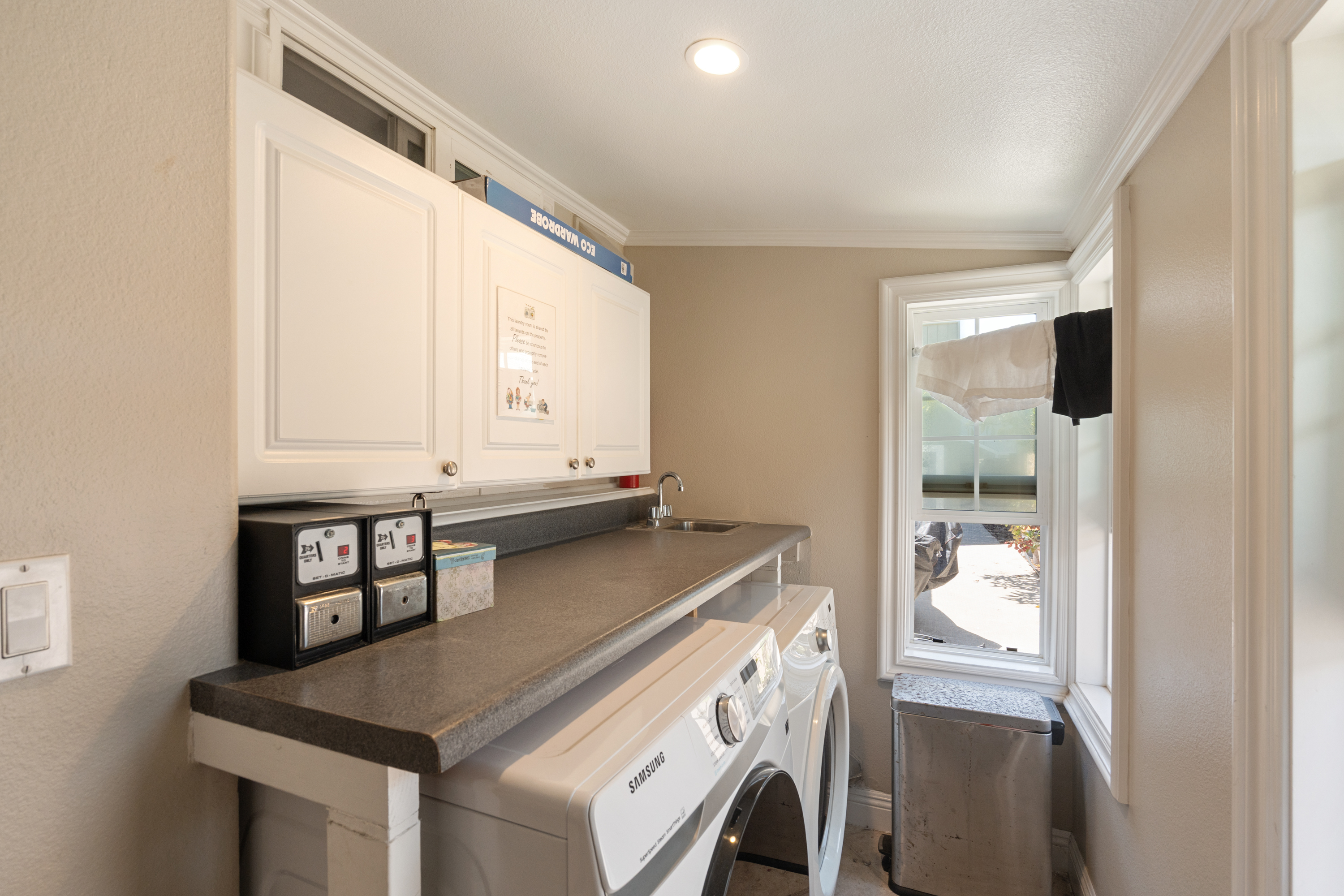 Indoor coin-operated laundry room at 711 Huntington Street.